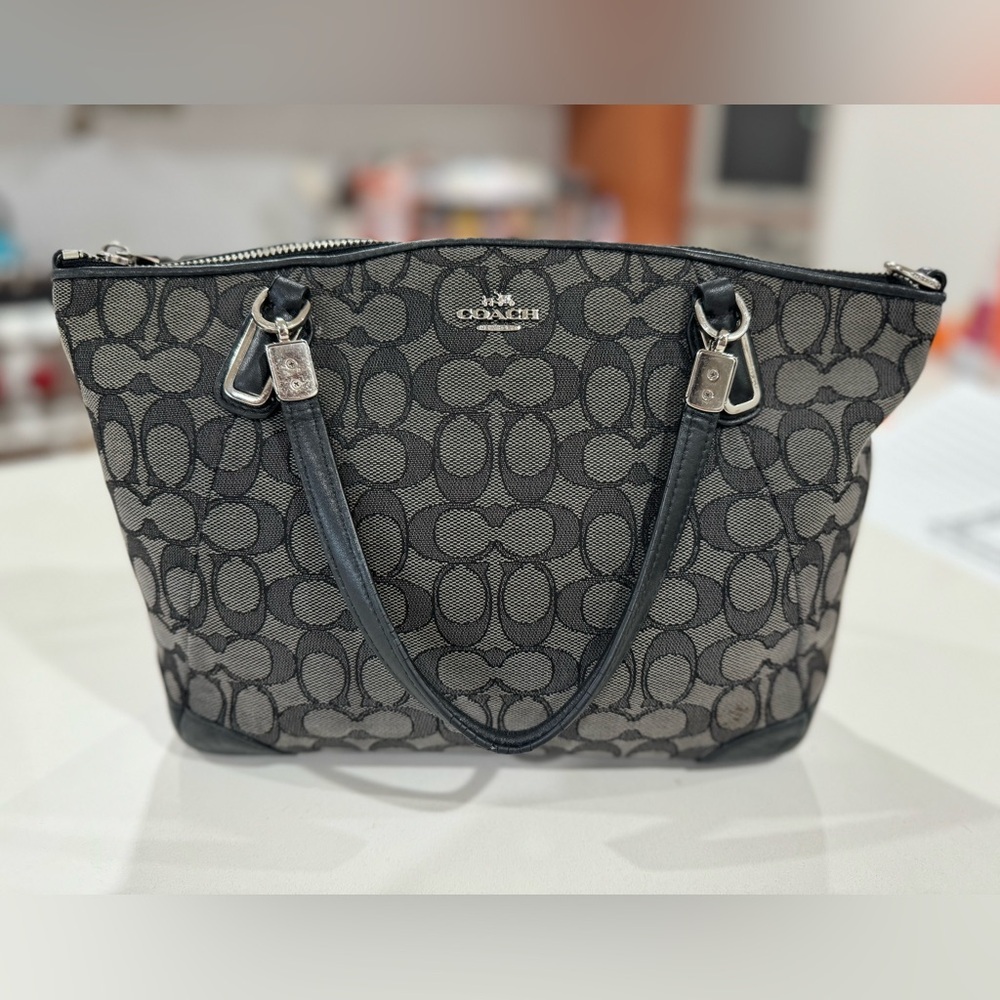 Coach signature handbag, black leather